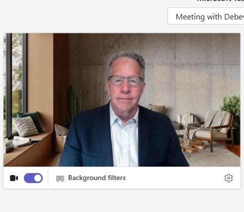 After: warm, professional lighting and a clean, styled background on a video call.