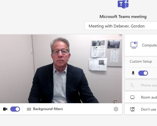 Before: flat overhead lighting and a cluttered background on the same video call.